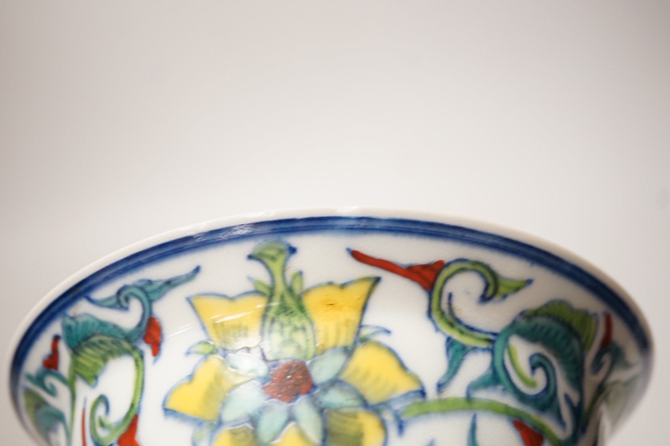 A near pair of Chinese doucai bowls. Tallest 7cm